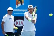 MELBOURNE, AUSTRALIA - JANUARY 18:  Rafael Nadal plays a backhand in a practice session during day one of the 2016 Australian Open at Melbourne Park on January 18, 2016 in Melbourne, Australia.  (Photo by Zak Kaczmarek/Getty Images)